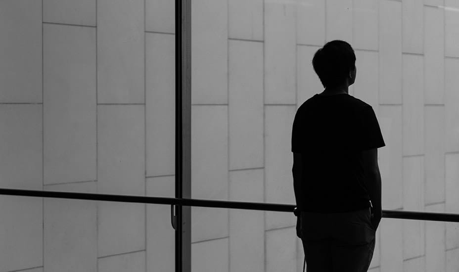 Student in shadows