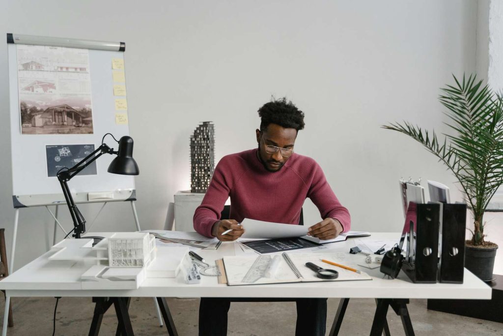 Architect looking over his plans.