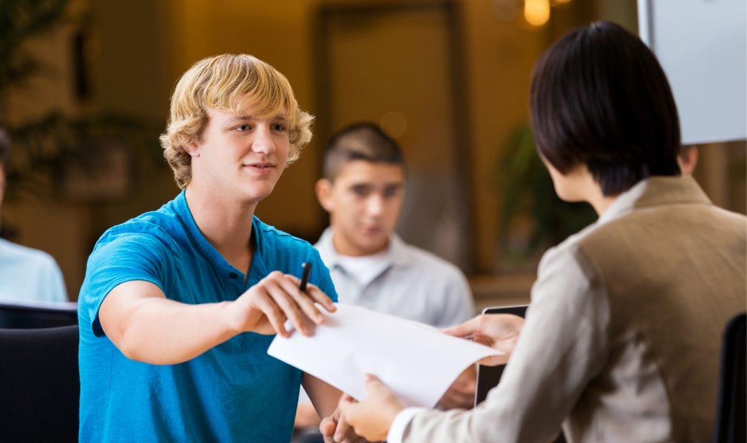 Student turns in paper.