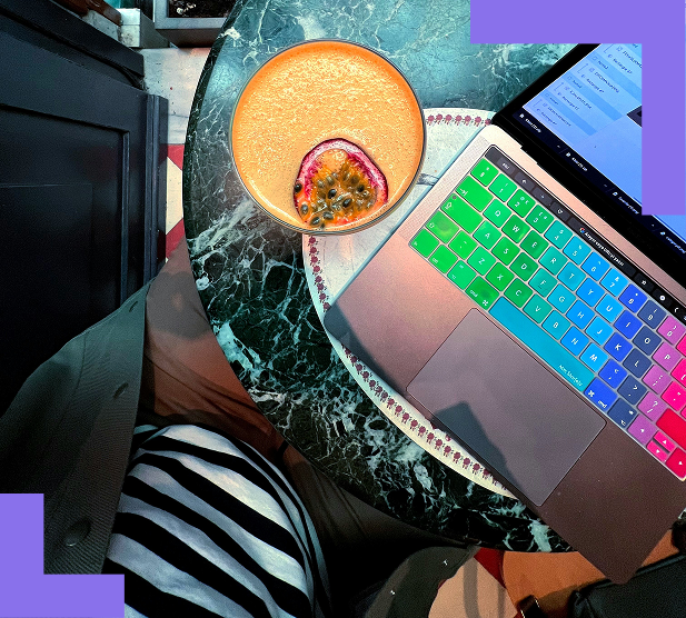 summeradventurestart Aerial shot of someone's laptop with a smoothie next to it