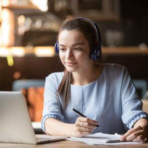 Young Woman At Her Desk