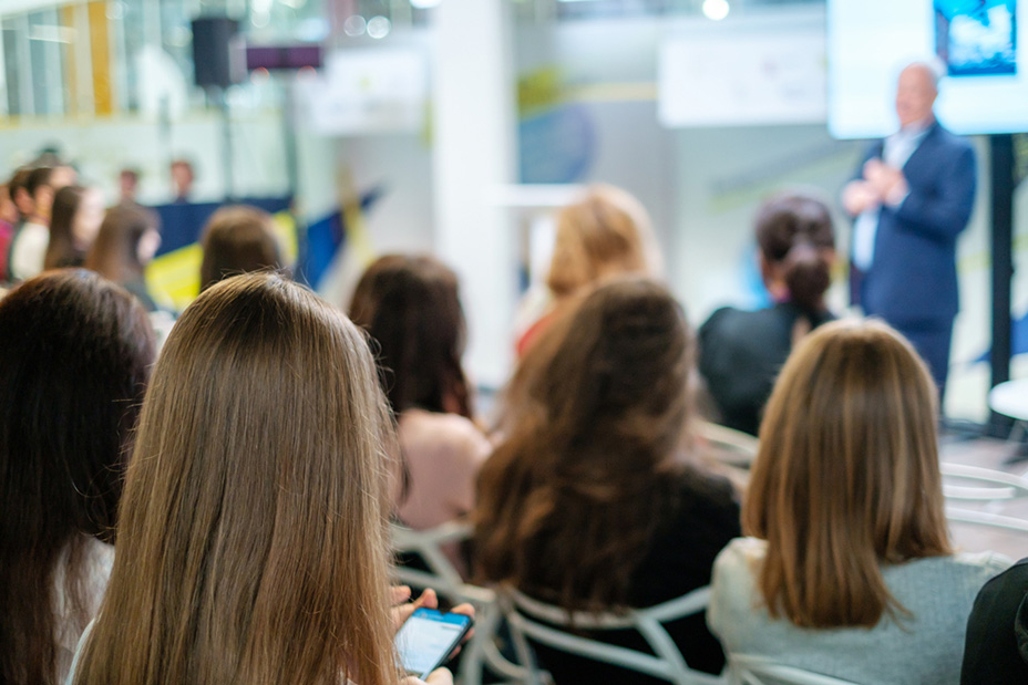 Audience listens lecturer